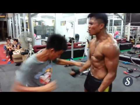 Super Saiyan Mode  Muay Thai Kickboxer Takes Punches To The Abdomen Like It's Nothing!