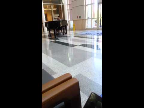 man playing piano at Johns Hopkins
