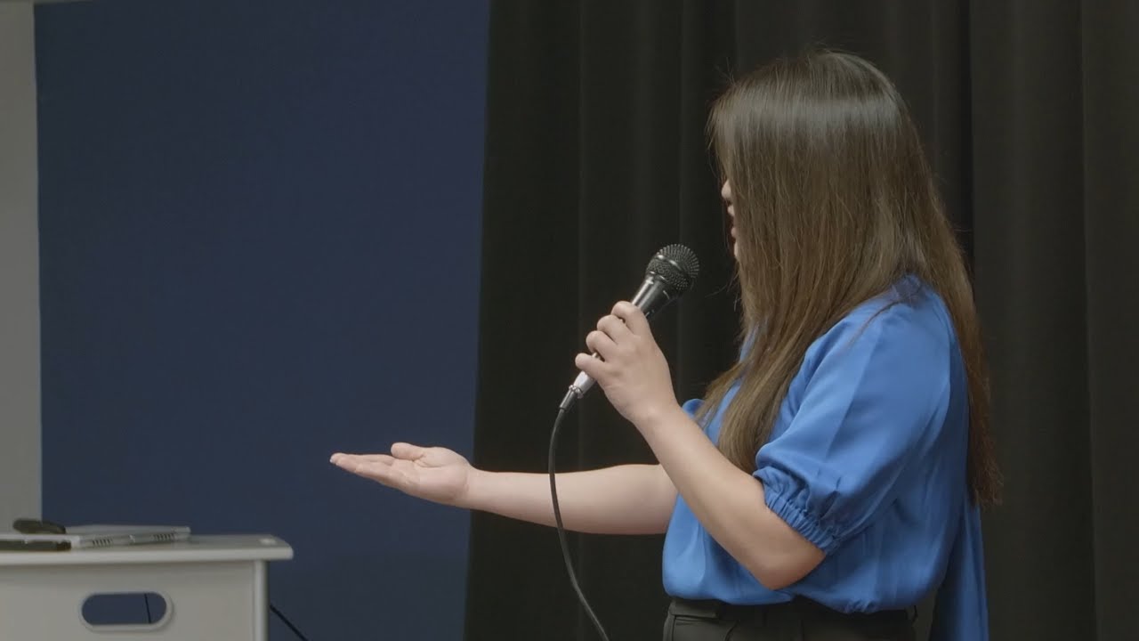 Katherine Lizardo on stage