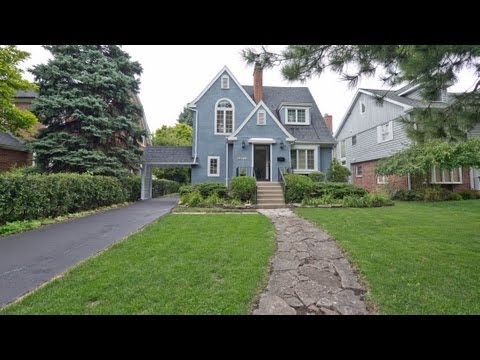 A lovingly-maintained Tudor in a convenient Elmhurst location