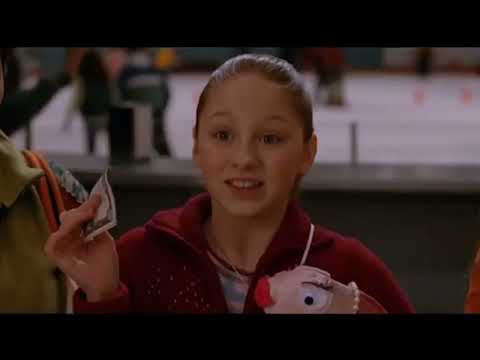 Trailer still: Casey holds an edge on one foot, boards blurred; a pop chorus crests