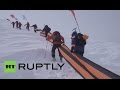 Камчатские спасатели украсили вершину Авачинской сопки 30-метровой георгиевской лентой ...