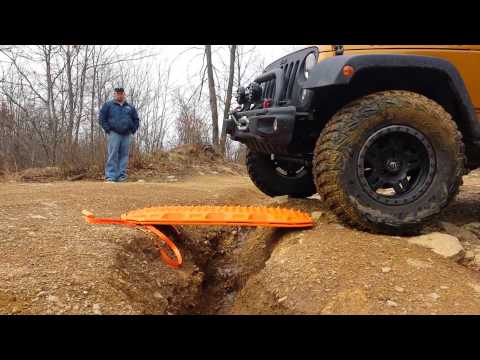 5600 pounds plus Jeep Rubicon bridging w/ Maxtrax