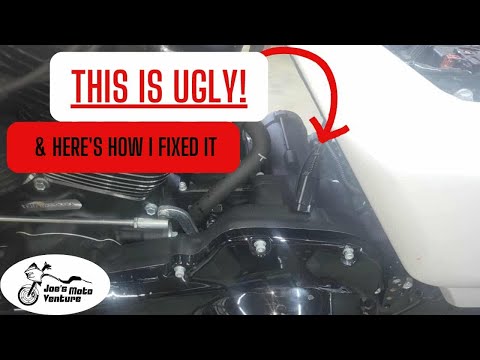 Fixing what Harley overlooked.  Relocating battery tender cable.