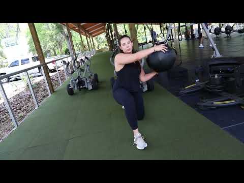 Try This Variation of a Medicine Ball Slam by Incorporating A Lunge and Twist to Work Your Core!