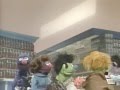 Classic Sesame Street Grover In Line At The Supermarket
