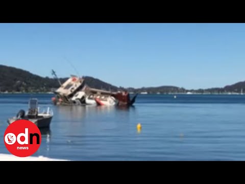 Dramatic Rescue as Barge Carrying Sewage Lorry Capsizes