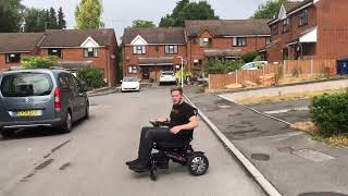 Taking curbs & cambers in a folding electric wheelchair for beginners