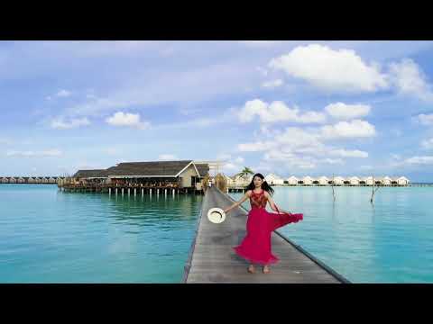 Beautiful Girl Dancing on the Beach