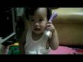 Majoe Playing And Answering A Toy Telephone