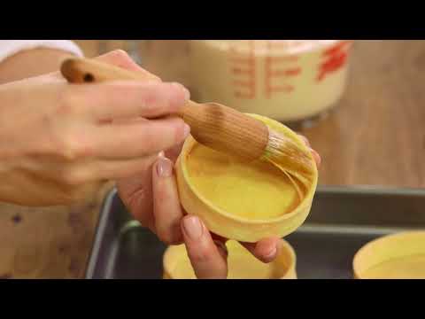 Part of a video titled Sealing Pastry with Egg Wash | Everyday Gourmet S8 E20 - YouTube