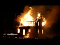 4K UHD Window Frame Burning And Collapsing During Intense House Fire