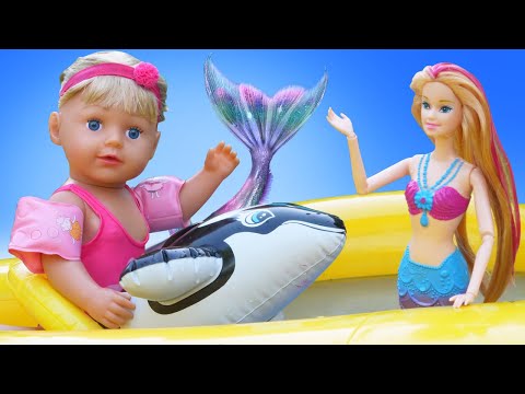 Baby Born -nukke uima-altaalla. Mermaid-nukke & onki. Vauvanuket & Barbie-nuket.