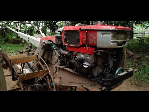 LandMaster / Rotary and wheel install. / kubota /Hand Tractor work in paddy field.