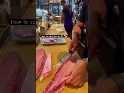 Breaking down a hamachi fillet for sushi.