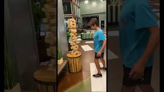 Kid fails Giant Jenga in the worst way possible