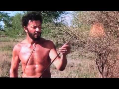 The Naked Prey (1965) flub - car driving in background