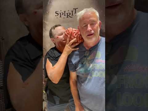 Zombie eating brains at the Zombie Walk at the River in Rancho Mirage