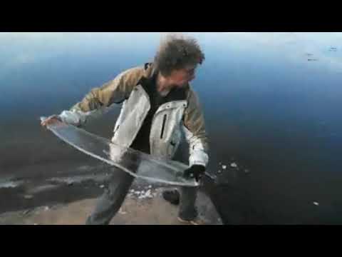 Breaking Ice on Frozen Lake. Best sound ever.