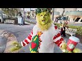 The Grinch Takes Over Celebration Florida Christmas Time Craziness BUSY Saturday Night Downtown