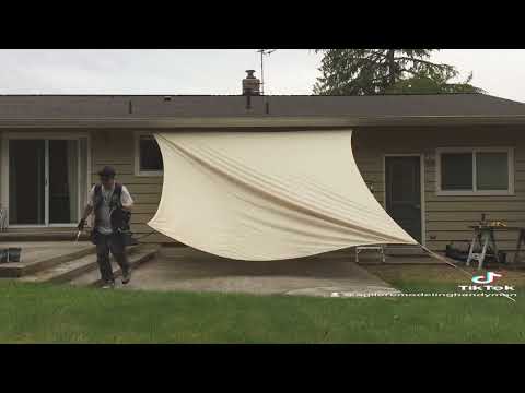 I installed this shade sail patio cover with no poles. 💪😎👍