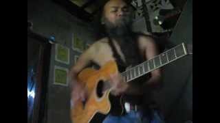 syllabic chanting  with open tuned guitar