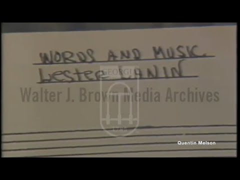 Lester Lanin Prepares to Present Price Charles with "My Lady Love" Sheet Music (June 17, 1981)