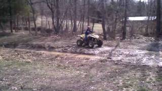 preview picture of video 'Aron Ridding through a big mud hole at lawrence county recreation park.'