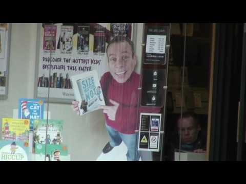 Dwarf in a Shop Window - Warwick Davis?