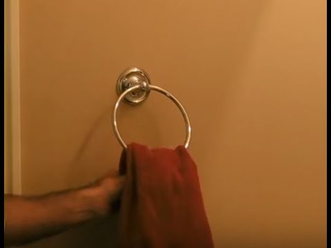 How to install a towel ring in a bathroom