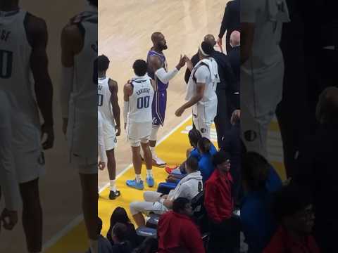 LeBron catching up with his old Teammates at the end of the game