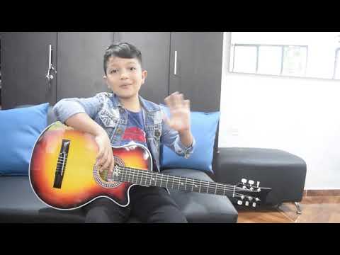 Aprende a tocar guitarra con Juany, (clase de guitarra para niños.)