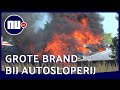 Grote brand bij autosloperij in Duiven | NU.nl