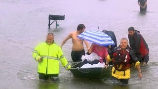Louisiana flood victims turn to each other to survive crisis