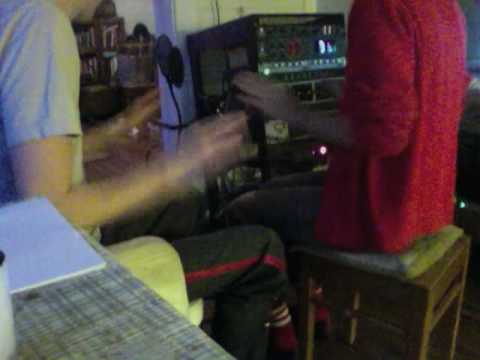 Jónsi and Alex doing percussion in their kitchen