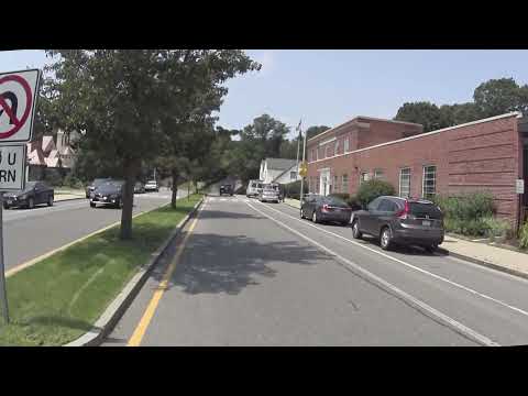 Riding next to the median on Concord Avenue, Belmont, Massachusetts