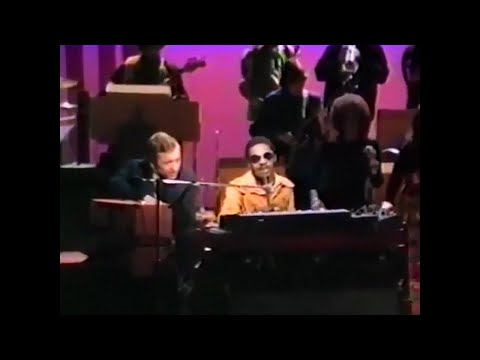 Stevie Wonder performs a talkbox rendition of "Close To You" and "Never Can Say Goodbye"