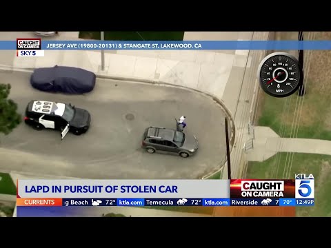 Passenger Jumps from Stolen Vehicle during Dangerous LAPD Pursuit - Caught on Camera
