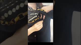 small touch of color is then used to brighten the look. #scarf #scarftying