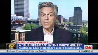 Huntman attacks Romney's record on jobs.