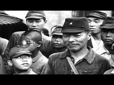 Hideki  Tojo in hospital after attempting suicide and Japanese people reads bulle...HD Stock Footage