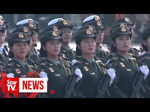 15 military units march in China's largest National Day parade