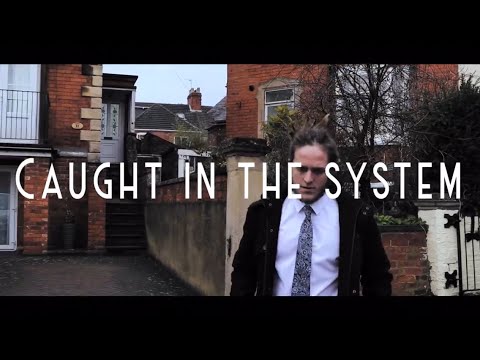 Caught In The System (Official Music Video)