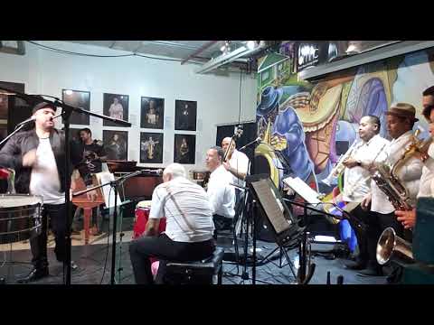 Danny morales performing with oreste kid ore