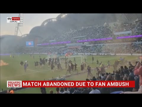 A-League Melbourne derby abandoned due to chaotic scenes with a violent pitch invasion