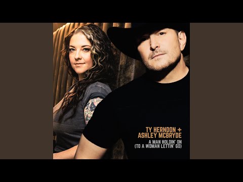 A Man Holdin' On (To a Woman Lettin' Go)