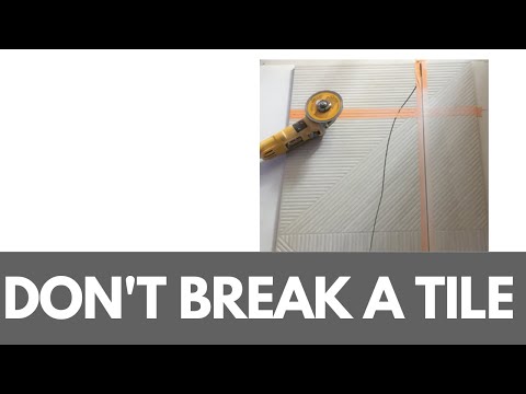 How to cut LARGE tiles with out breaking them.