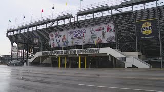 Banner at IMS entrance pays tribute to three decades of Brickyard champions