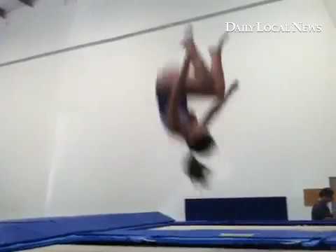 Brianna kozlowski practices on the trampoline
