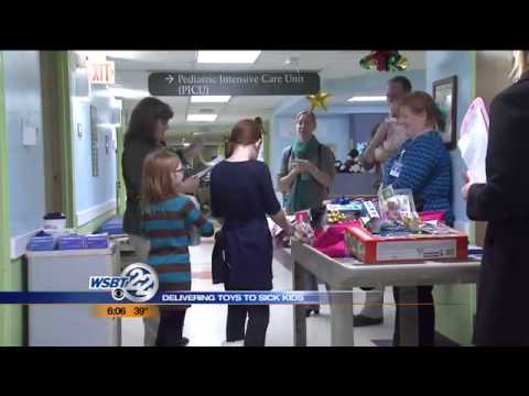 Benton Harbor sisters, 8 & 10, donate toys to sick kids